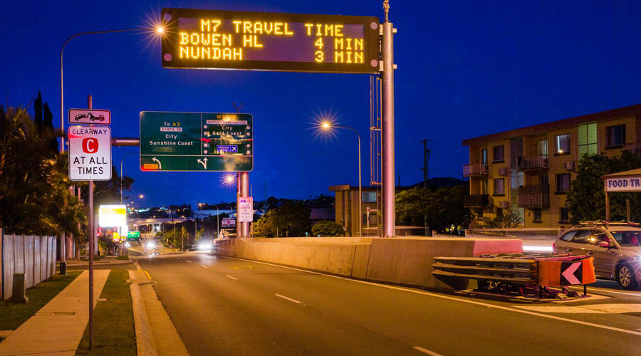 Variable message sign installed above a road
